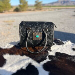 SOLD. Elegant Black Embossed Handbag